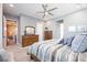 Spacious bedroom with ample natural light and wood dresser at 12822 Rainwashed Loop, Parrish, FL 34219