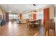 Bright dining room featuring a wood table and coordinating chairs at 12822 Rainwashed Loop, Parrish, FL 34219