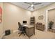 Spacious home office with desk, shelving, and carpeting at 12822 Rainwashed Loop, Parrish, FL 34219