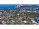 Scenic aerial shot showcasing the home's location amidst a vibrant coastal community at 1302 Roberts Bay Ln, Sarasota, FL 34242