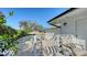 Tranquil backyard featuring stylish outdoor seating and views of the sparkling pool at 1302 Roberts Bay Ln, Sarasota, FL 34242