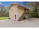 Detached guest house with private deck and stairs at 14018 Pine Woods E Ln, Sarasota, FL 34240