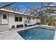 Relaxing screened pool and spa with spacious deck at 14018 Pine Woods E Ln, Sarasota, FL 34240