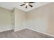 Bedroom with wood-look floors and ceiling fan at 144 Spring Dr, Rotonda West, FL 33947