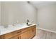 Laundry room with modern cabinetry and quartz countertop at 144 Spring Dr, Rotonda West, FL 33947