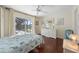 Bedroom with pool view and a queen-size bed at 1441 Gleneagles Dr, Venice, FL 34292