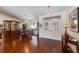 Formal dining room with hardwood floors, large china cabinet, and chandelier at 1441 Gleneagles Dr, Venice, FL 34292