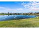 Tranquil lake view from the backyard at 1441 Gleneagles Dr, Venice, FL 34292