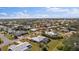 Wide aerial view of neighborhood, highlighting the house's location at 157 Da Vinci Dr, Nokomis, FL 34275