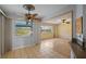 Dining area with tiled floor and access to living room and kitchen at 157 Da Vinci Dr, Nokomis, FL 34275