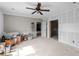 Unfinished bedroom featuring a ceiling fan, neutral walls, and trim work at 17555 Lake Worth Blvd, Port Charlotte, FL 33948