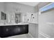 Double vanity bathroom with a large walk-in shower at 2006 Red Lake Run, Bradenton, FL 34211