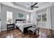 Spacious bedroom with wood floors and large windows at 2006 Red Lake Run, Bradenton, FL 34211