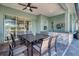 Outdoor patio with seating area, built-in bar, and ceiling fan at 2006 Red Lake Run, Bradenton, FL 34211