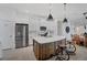 Modern kitchen with stainless steel appliances and an island at 2006 Red Lake Run, Bradenton, FL 34211