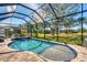 Relaxing screened pool with ample lounge space at 2006 Red Lake Run, Bradenton, FL 34211