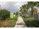 Landscaped walkway leading to community amenities at 2006 Red Lake Run, Bradenton, FL 34211