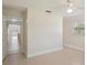 Bright bedroom with tile flooring, a ceiling fan, and plenty of natural light at 20313 Navajo Ln, Port Charlotte, FL 33952