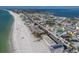 Broad aerial view of the property near the sandy beach and a beautiful coastline at 2310 Gulf N Dr # 201, Bradenton Beach, FL 34217