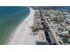 Expansive aerial perspective of the property near the beach and picturesque ocean at 2310 Gulf N Dr # 201, Bradenton Beach, FL 34217