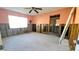 Main bedroom under renovation, with exposed framing at 2701 Larkspur Dr, Punta Gorda, FL 33950