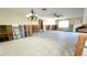 Large living room undergoing renovation, with exposed framing at 2701 Larkspur Dr, Punta Gorda, FL 33950