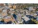 Aerial view of buildings, trees and a rooftop pool at 300 S Pineapple Ave # 802, Sarasota, FL 34236