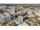 Overhead aerial view of buildings and lush trees at 300 S Pineapple Ave # 802, Sarasota, FL 34236