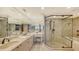 Elegant bathroom with double vanity and large shower at 360 Gulf Of Mexico Dr # 332, Longboat Key, FL 34228