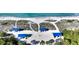 Private beach access with covered picnic areas at 360 Gulf Of Mexico Dr # 332, Longboat Key, FL 34228