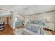 Spacious bedroom with light flooring and mirrored closet doors at 360 Gulf Of Mexico Dr # 332, Longboat Key, FL 34228