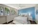 Guest bedroom with a coastal theme and window seating at 360 Gulf Of Mexico Dr # 332, Longboat Key, FL 34228