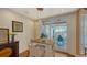 Bright breakfast nook with access to a balcony at 360 Gulf Of Mexico Dr # 332, Longboat Key, FL 34228