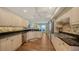 Modern kitchen with stainless steel appliances and hardwood floors at 360 Gulf Of Mexico Dr # 332, Longboat Key, FL 34228