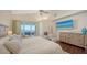 Main bedroom with stunning water views and balcony access at 360 Gulf Of Mexico Dr # 332, Longboat Key, FL 34228