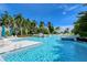 Large resort-style pool with plenty of seating at 360 Gulf Of Mexico Dr # 332, Longboat Key, FL 34228