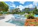 Tranquil spa and pool area with waterfalls at 360 Gulf Of Mexico Dr # 332, Longboat Key, FL 34228