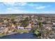 An aerial view of a suburban community showing a home on a lakefront property at 3718 61St St, Bradenton, FL 34209