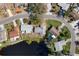 Aerial view showcasing home's location on cul-de-sac and pond at 3718 61St St, Bradenton, FL 34209