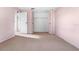 Bedroom with carpet flooring and closet with double doors at 3718 61St St, Bradenton, FL 34209