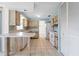 Kitchen featuring light blue accents, a breakfast bar, and tile floors at 3718 61St St, Bradenton, FL 34209