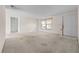 Living room featuring neutral walls with a sliding door at 3718 61St St, Bradenton, FL 34209