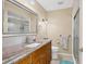 Bathroom boasts granite countertop and walk-in shower at 3749 Amesbury Ln # 5608, Sarasota, FL 34232