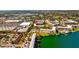 Aerial view of condo community near shopping center and waterfront at 4126 Heron Way # B113, Bradenton, FL 34205