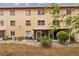 Exterior of building with patio and door to sunroom at 4126 Heron Way # B113, Bradenton, FL 34205