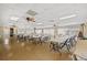 Large meeting space, with tables, chairs, and lots of natural light at 4126 Heron Way # B113, Bradenton, FL 34205