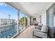 Spacious balcony overlooking waterfront with seating at 4320 Falmouth Dr # 301, Longboat Key, FL 34228