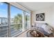 Balcony with seating area and peaceful water view at 4320 Falmouth Dr # 301, Longboat Key, FL 34228