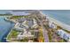 Aerial view of waterfront community with pool and beach access at 4430 Exeter Dr # 104, Longboat Key, FL 34228