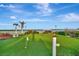 Relaxing waterfront putting green at 4430 Exeter Dr # 104, Longboat Key, FL 34228